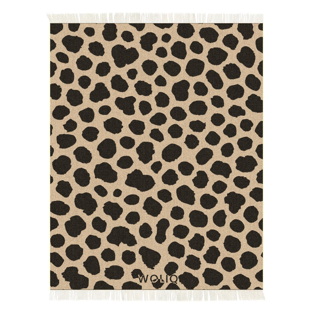 Black and brown cow print wool blanket – WOLIQ Earthbound front view