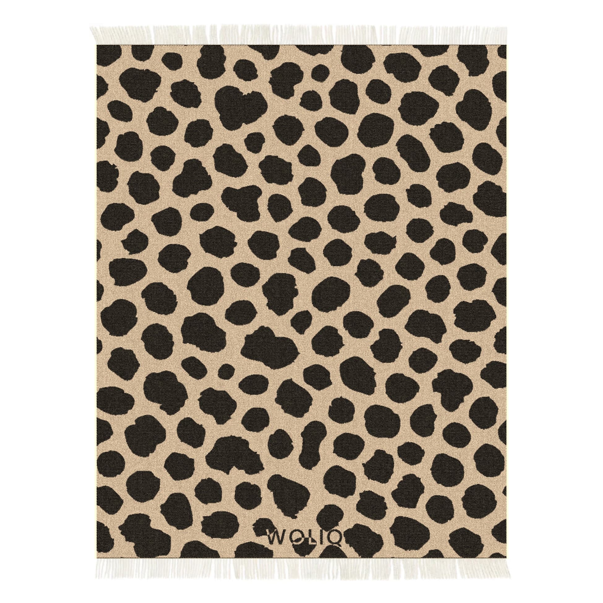 Black and brown cow print wool blanket – WOLIQ Earthbound front view