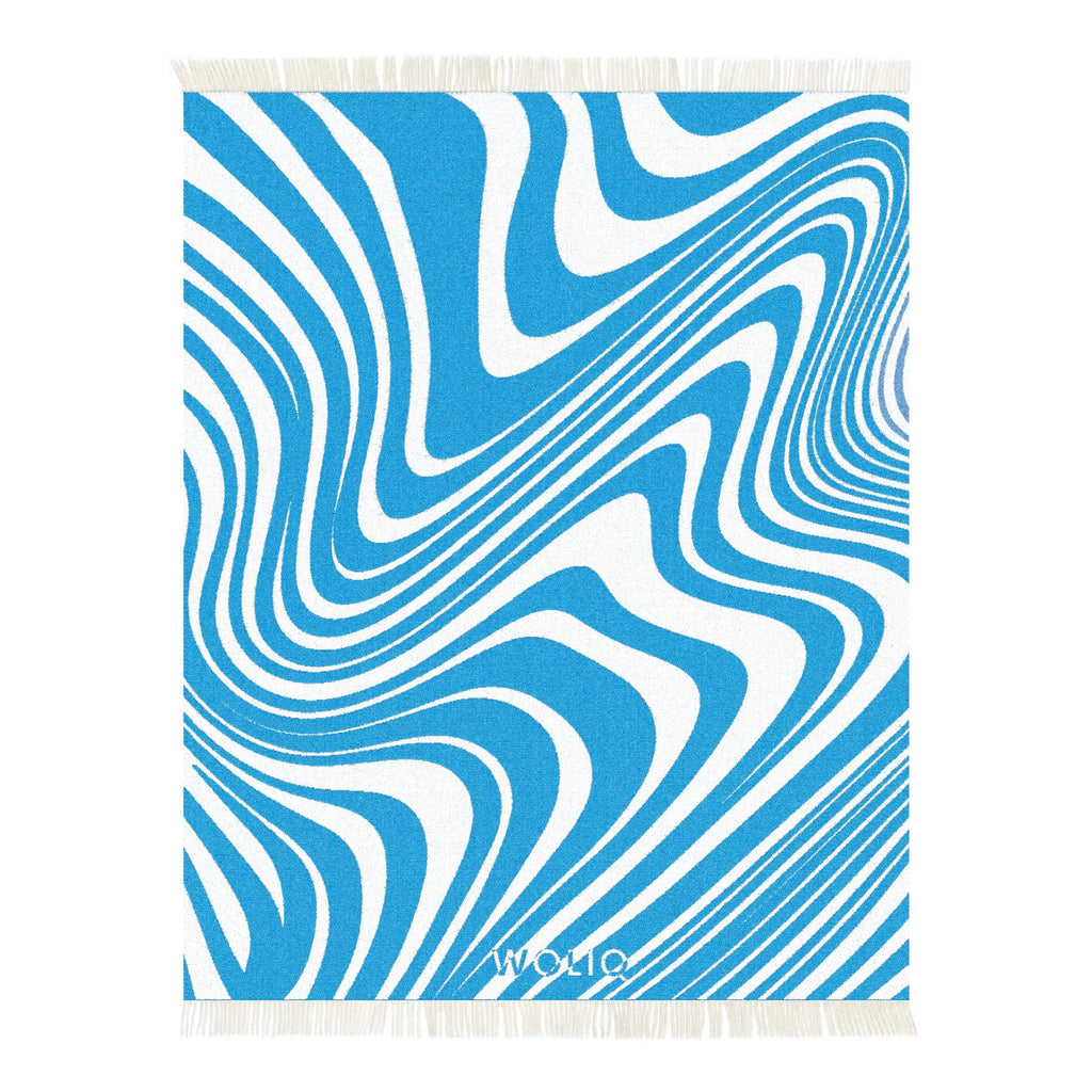 Blue and white wavy pattern wool blanket – WOLIQ Ocean Rhythm front view