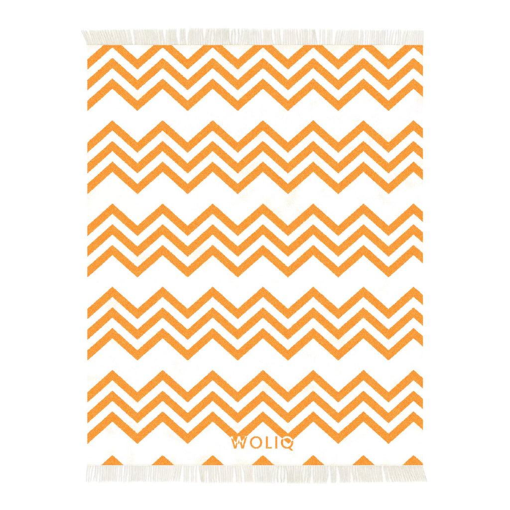 Orange and white zigzag wool blanket – WOLIQ Warm Glow front view